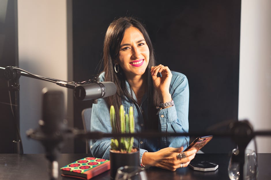 Professional podcast interview studio with modern equipment and comfortable seating arrangement